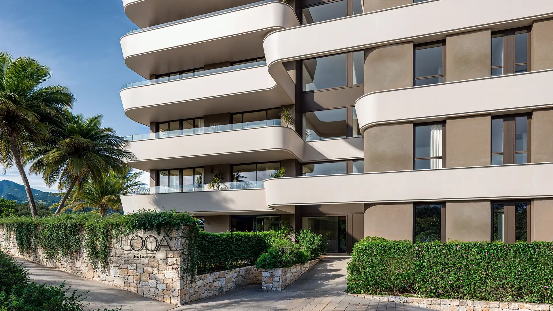 New development with contemporary curved white architecture in Estepona, Costa del Sol